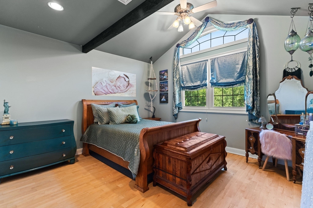 1276 Old Fall River Road Dartmouth, MA 02747 - Photo 33 of 42 a bed room with a bed and a chair