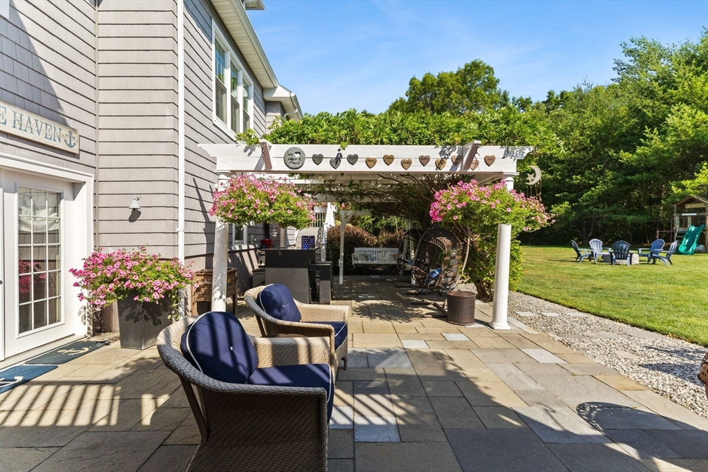 1276 Old Fall River Road Dartmouth, MA 02747 - Photo 38 of 42 a view of outdoor space yard deck patio and outdoor kitchen