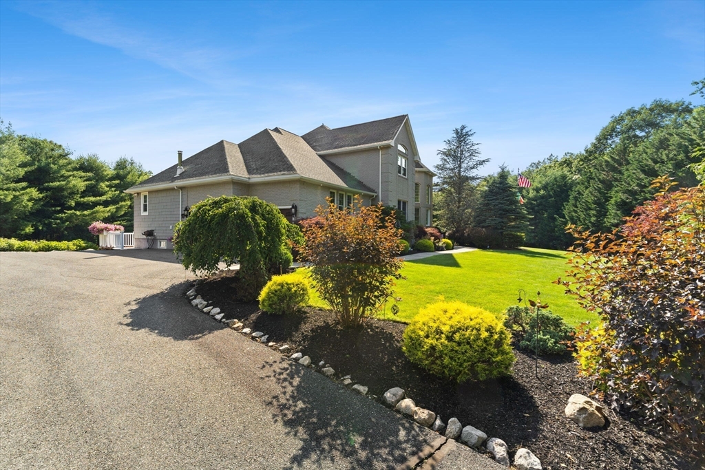 1276 Old Fall River Road Dartmouth, MA 02747 - Photo 39 of 42 a street view with tall buildings