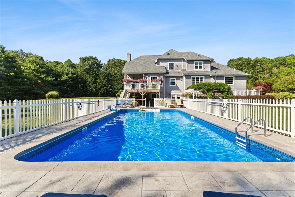 1276 Old Fall River Road Dartmouth, MA 02747 - Photo 41 of 42 a view of a house with wooden floor and a yard