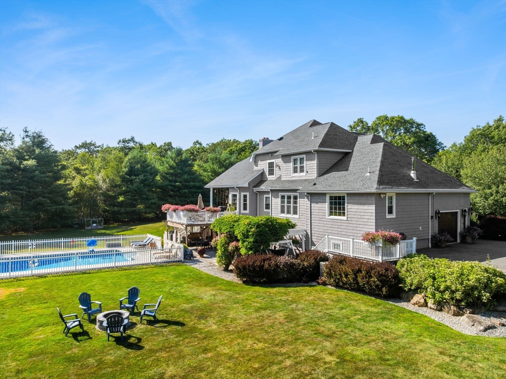 1276 Old Fall River Road Dartmouth, MA 02747 - Photo 6 of 42 a front view of house with yard and outdoor seating