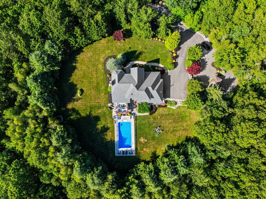 1276 Old Fall River Road Dartmouth, MA 02747 - Photo 8 of 42 an aerial view of a house with a yard and large trees