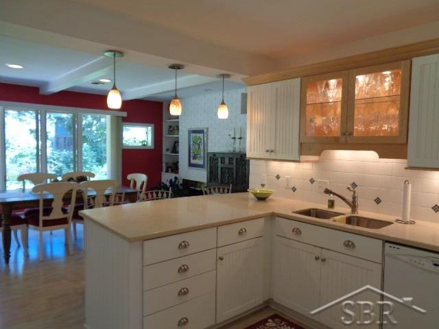 401 Stoneham Road Saginaw, MI 48638 - Photo 11 of 24 White Cabinets and Applia