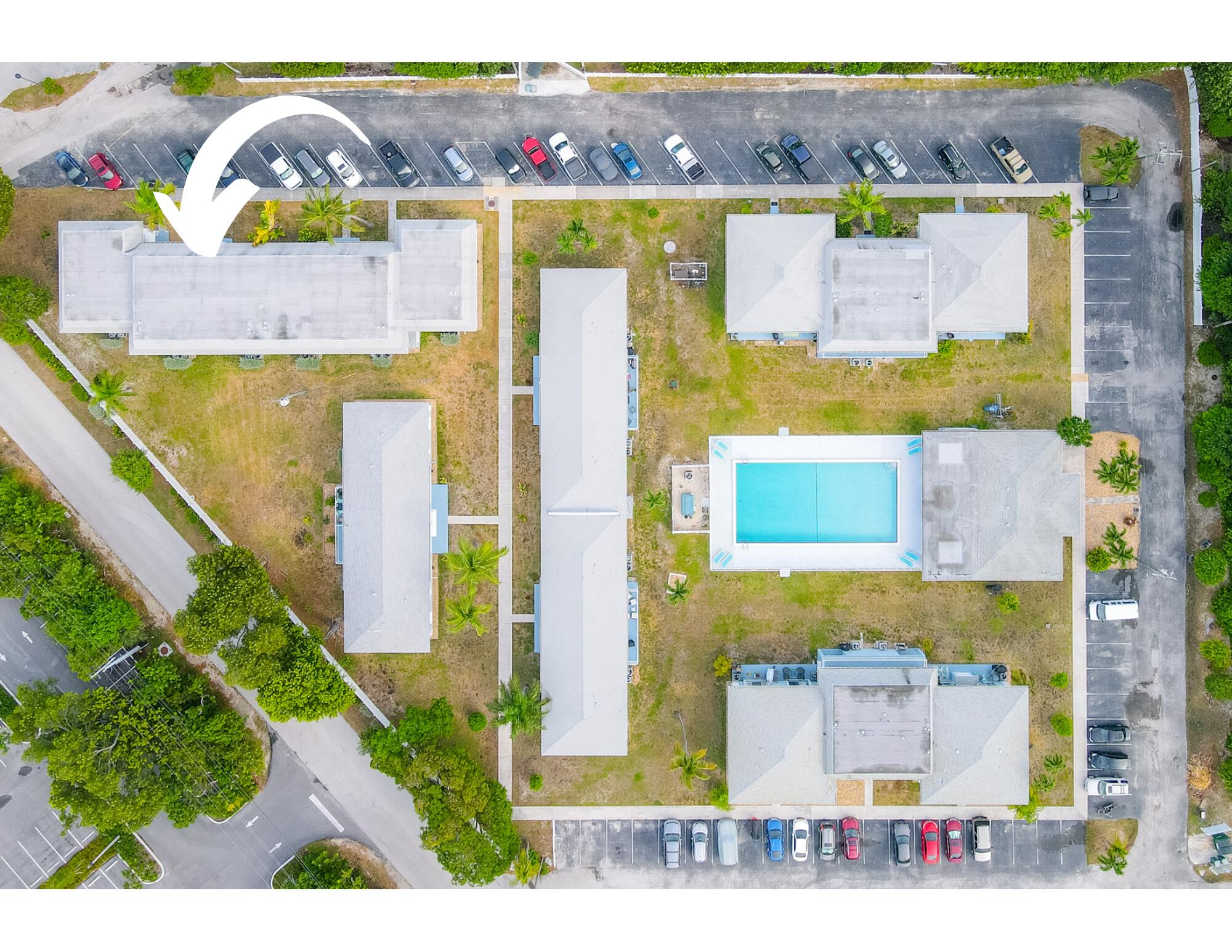40 High Point Road, Unit F205 Tavernier, FL 33070 - Photo 1 of 14 an aerial view of a house with a swimming pool