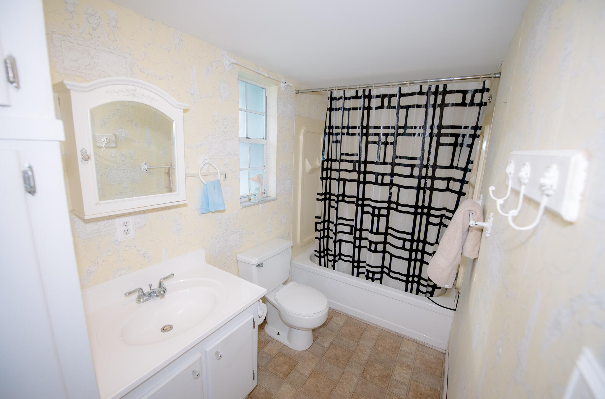 40 High Point Road, Unit F205 Tavernier, FL 33070 - Photo 14 of 14 a bathroom with a sink toilet and shower