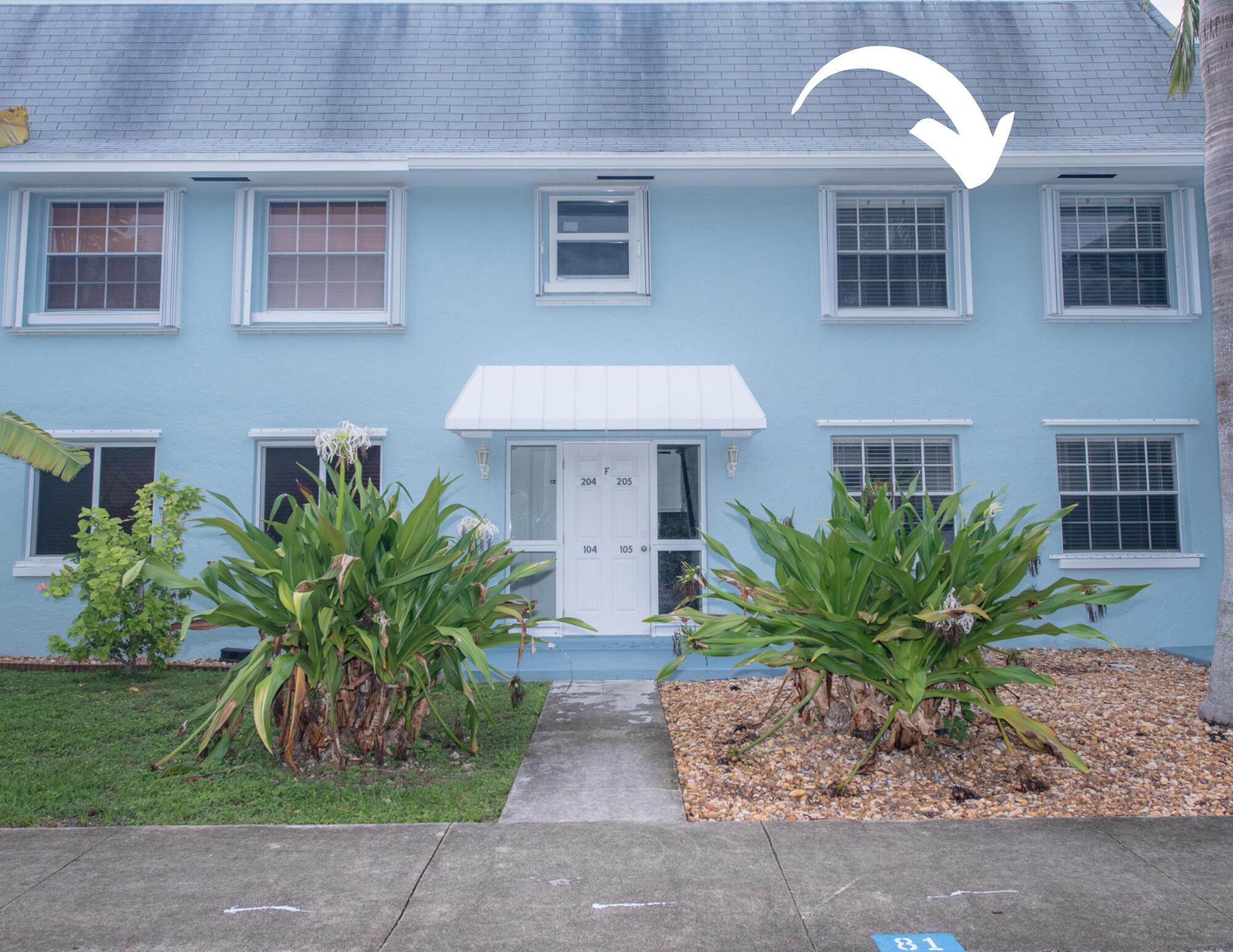 40 High Point Road, Unit F205 Tavernier, FL 33070 - Photo 4 of 14 a front view of house with yard