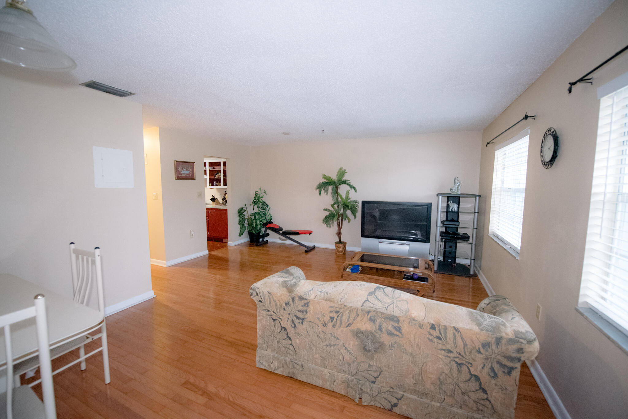 40 High Point Road, Unit F205 Tavernier, FL 33070 - Photo 6 of 14 a living room with furniture a flat screen tv and a large window