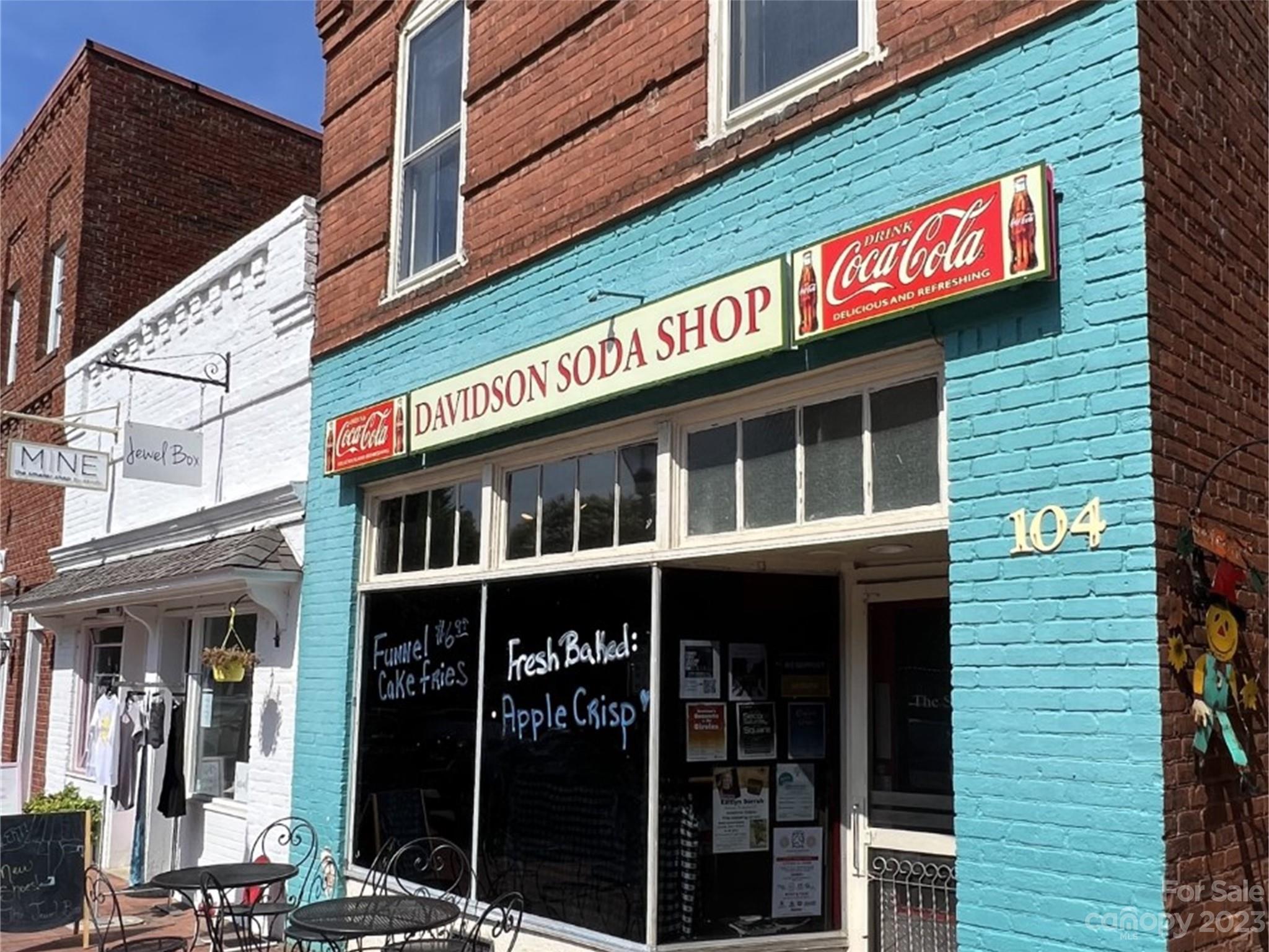 150 Copper Pne Lane, Unit 4 Davidson, NC 28036 - Photo 18 of 21 a sign on the side of a building