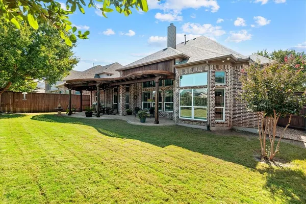 a view of a house with a swimming pool