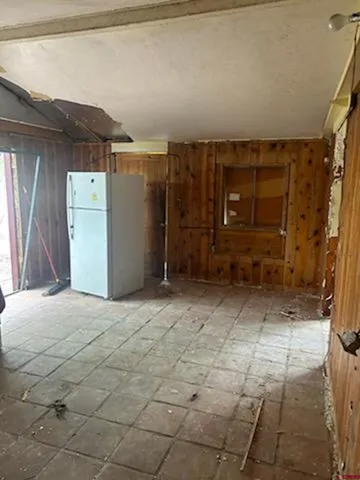 a view of a backyard of the house