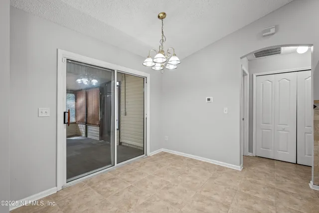 wooden floor in an empty room with a mirror