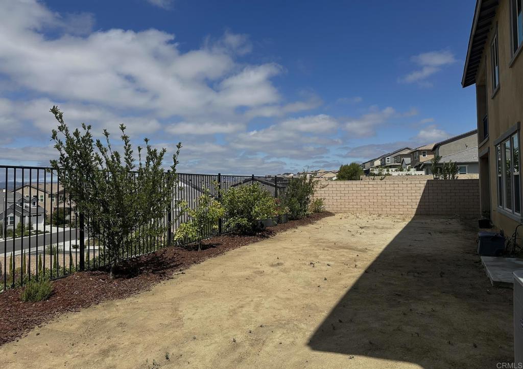 39529 Dayspring Way Temecula, CA 92591 - Photo 17 of 49 a view of a backyard of the house