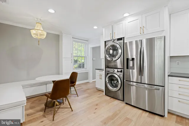 a view of a room with washer and dryer