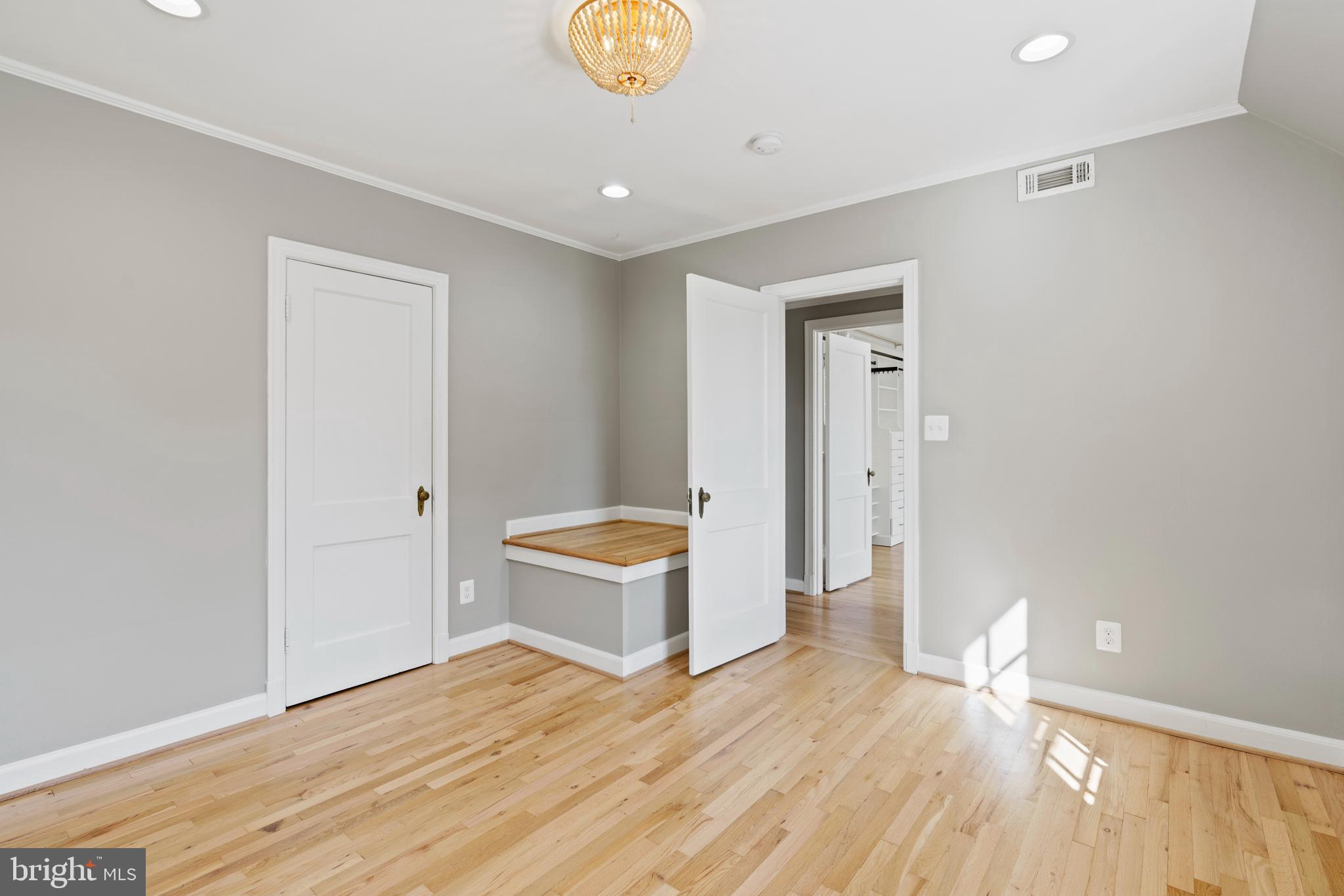 1300 South Cleveland Street, Unit 363 Arlington, VA 22204 - Photo 24 of 37 a view of empty room with wooden floor