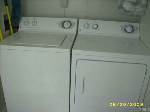 1420 Sykes Road Spring Hope, NC 27882 - Photo 11 of 11 washer and dryer in utility room