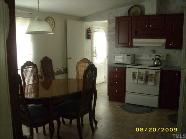 1420 Sykes Road Spring Hope, NC 27882 - Photo 6 of 11 kitchen looking at utility room and back door