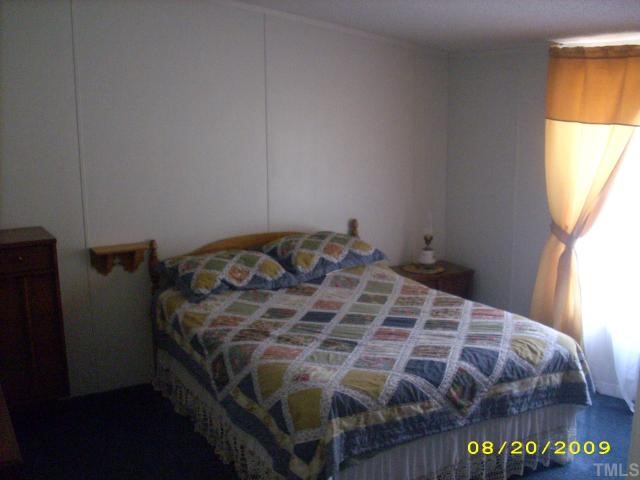 1420 Sykes Road Spring Hope, NC 27882 - Photo 7 of 11 master bedroom