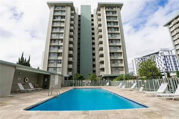 a view of a swimming pool with a patio
