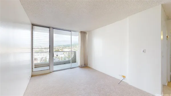 a view of an empty room with window