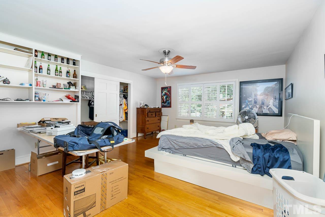 1221 Dixie Trail Raleigh, NC 27607 - Photo 17 of 26 a living room with furniture and a large window