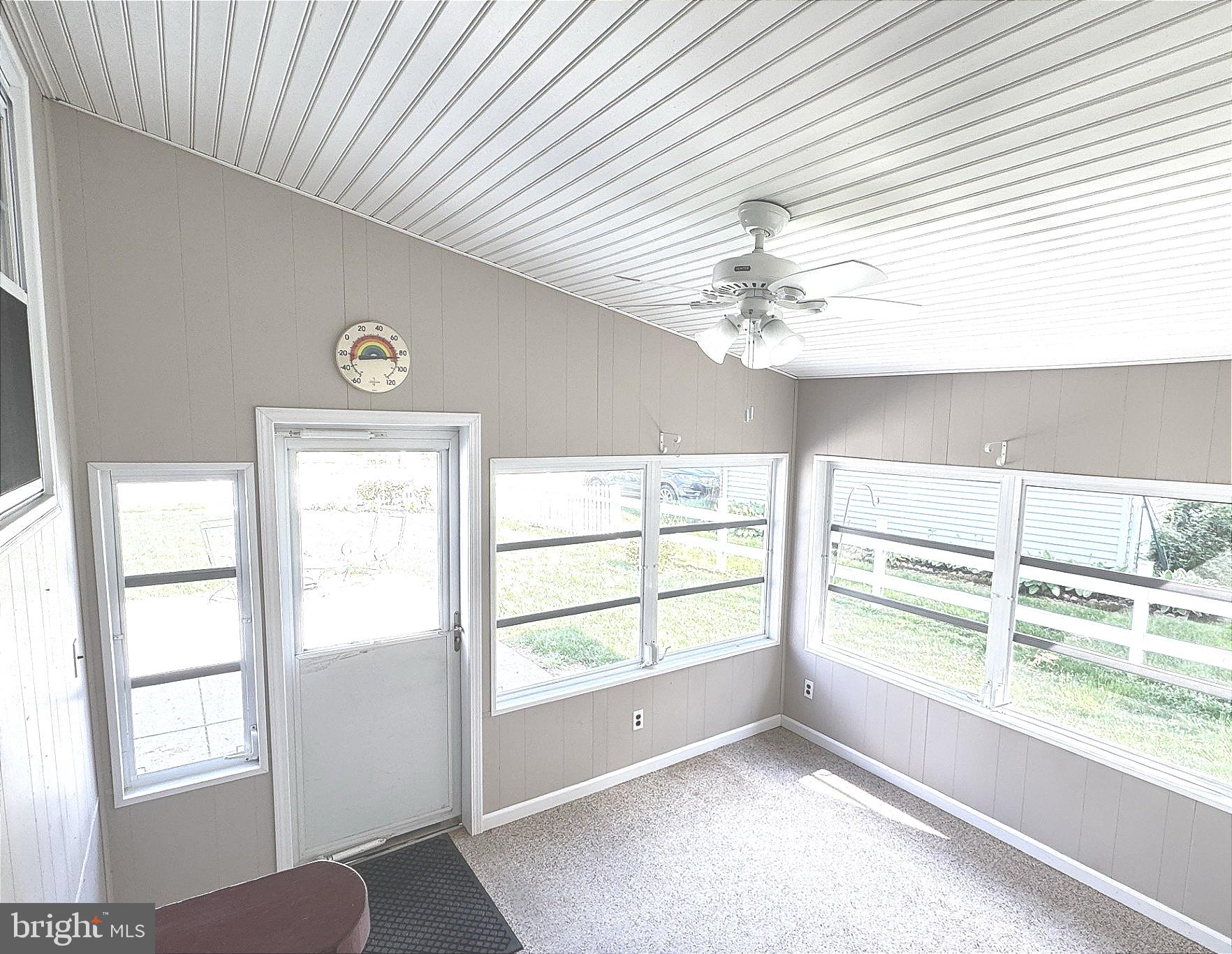 309 Cambridge Road Camden, DE 19934 - Photo 21 of 36 Enclosed porch w ceiling fan