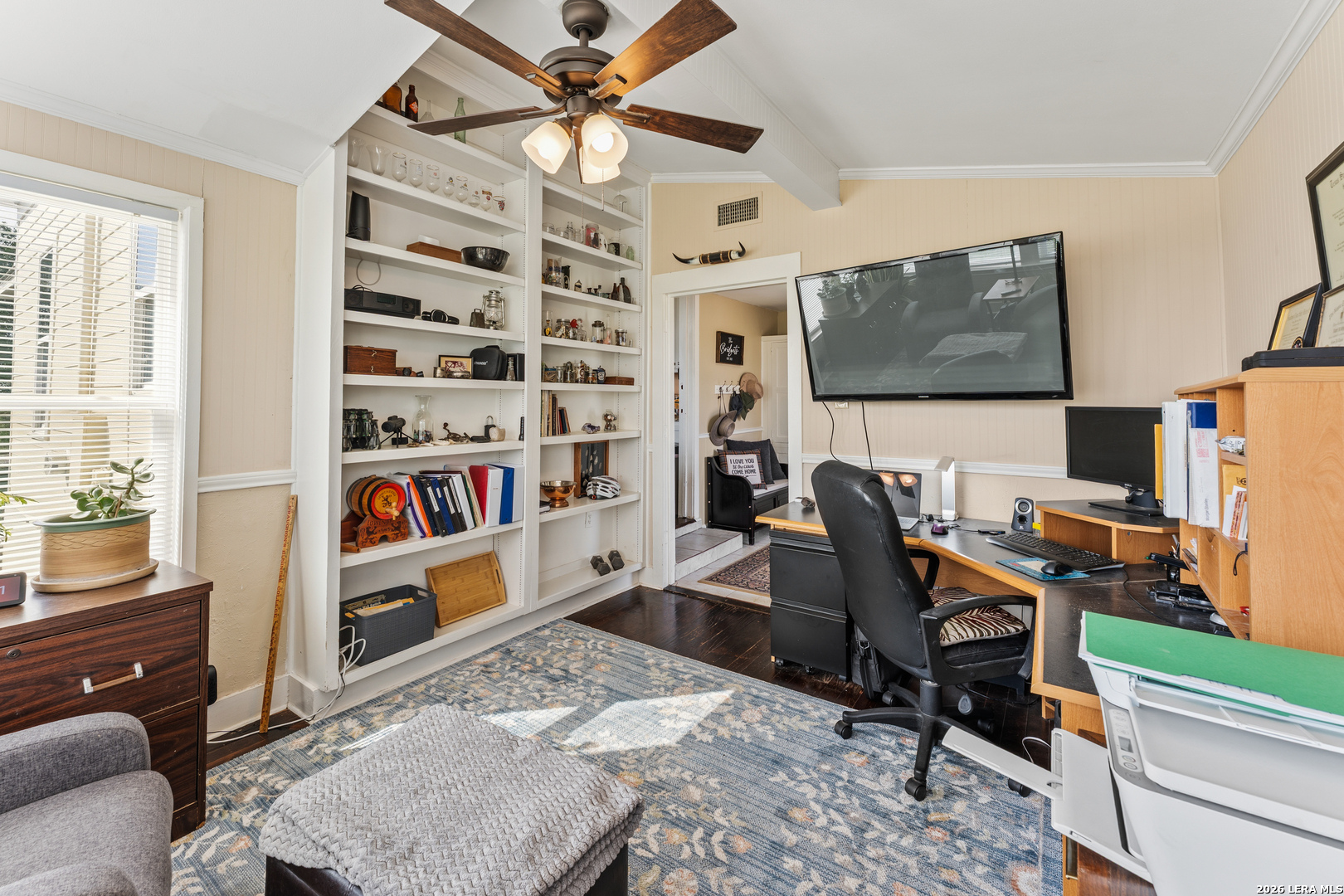 4515 Stapper Road St. Hedwig, TX 78152 - Photo 28 of 64 a workspace with furniture and a book shelf