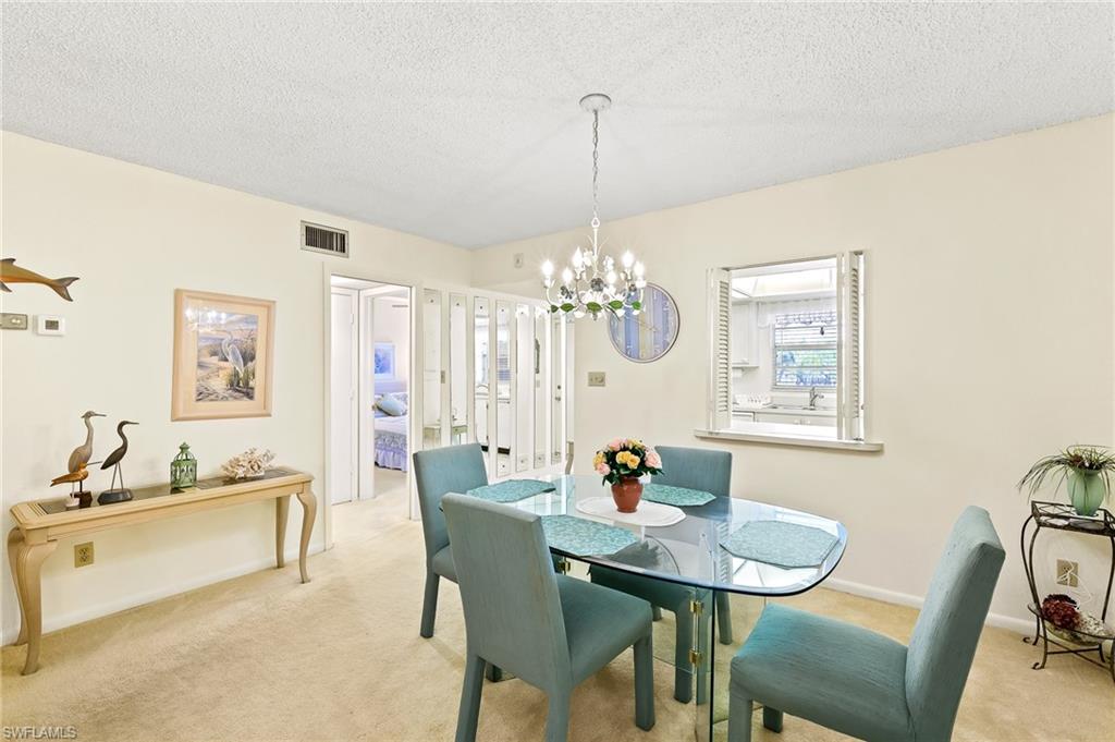 5467 Rattlesnake Hammock Road, Unit 302C Naples, FL 34113 - Photo 11 of 29 Dining area