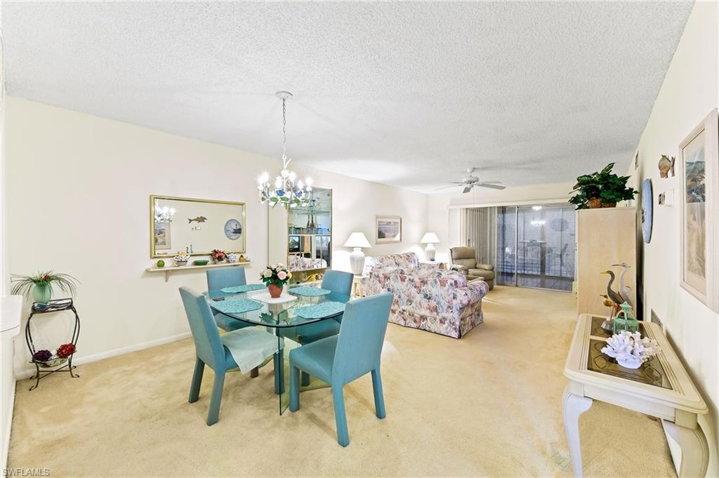 5467 Rattlesnake Hammock Road, Unit 302C Naples, FL 34113 - Photo 12 of 29 Dining/Living