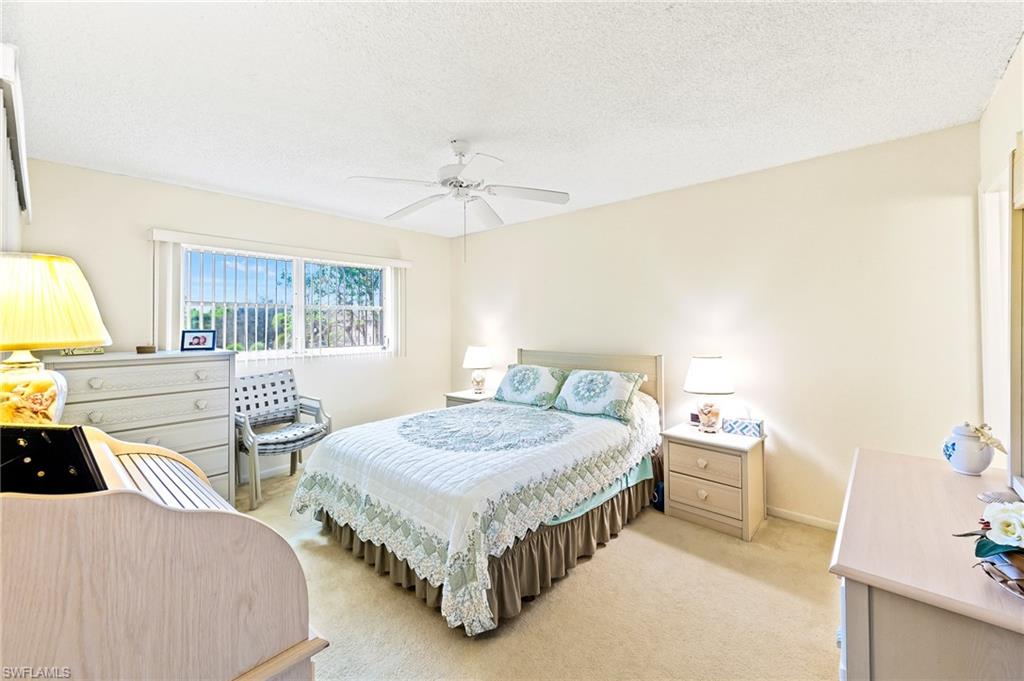 5467 Rattlesnake Hammock Road, Unit 302C Naples, FL 34113 - Photo 18 of 29 Primary bedroom
