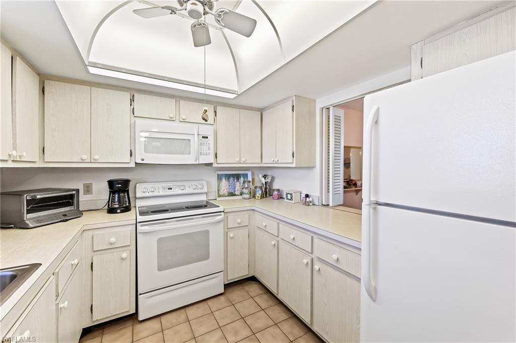 5467 Rattlesnake Hammock Road, Unit 302C Naples, FL 34113 - Photo 8 of 29 Lots of cabinets