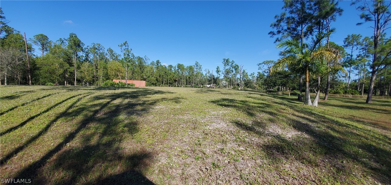 20500 Corkscrew Road Estero, FL 33928 - Photo 1 of 12 a view of a backyard of a house