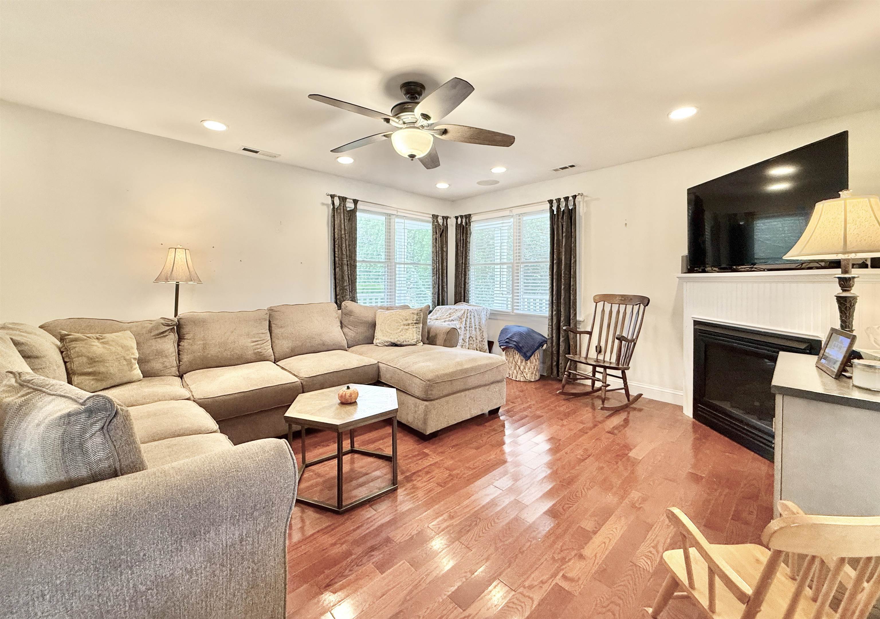 1981 Tuckahoe Road Woodbine, NJ 08270 - Photo 18 of 37 a living room with furniture a fireplace and a flat screen tv
