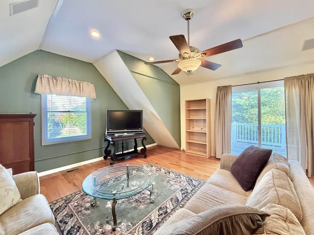 a bathroom with a toilet and shower