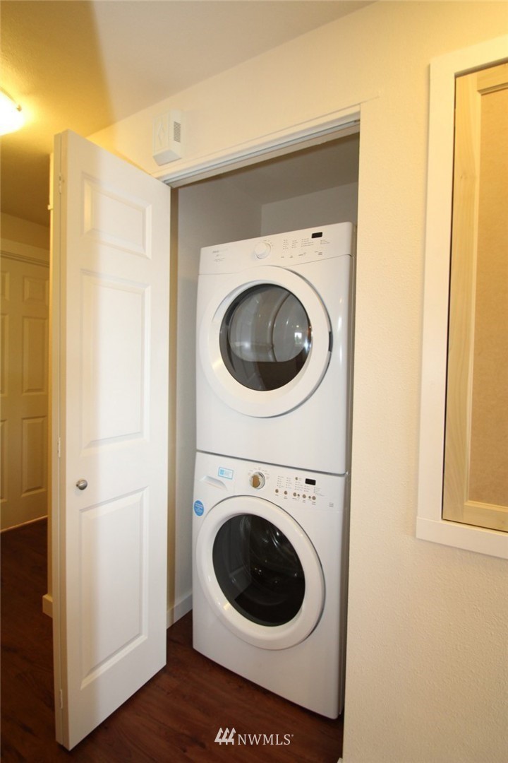 81 Southwest 2nd Street Renton, WA 98057 - Photo 19 of 22 a view of a hallway with washer and dryer