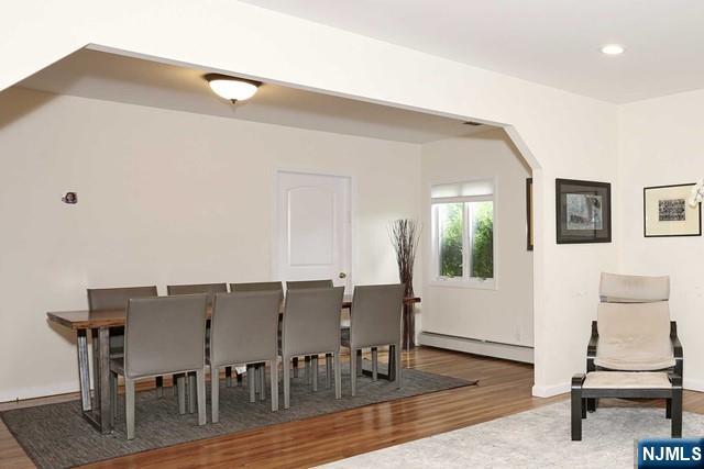 84 12th Street Cresskill, NJ 07626 - Photo 6 of 45 a view of a livingroom with furniture and a table