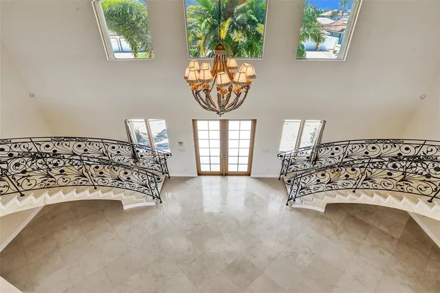 a swimming pool with outdoor seating and yard