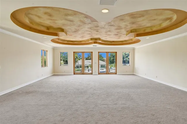 a view of swimming pool with a table and chairs