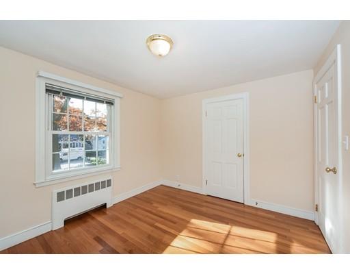 13 Churchill Road Marblehead, MA 01945 - Photo 12 of 26 a view of an empty room with wooden floor and a window