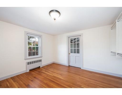 13 Churchill Road Marblehead, MA 01945 - Photo 19 of 26 a view of an empty room with wooden floor and a window