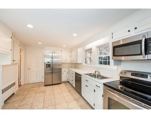 13 Churchill Road Marblehead, MA 01945 - Photo 7 of 26 a kitchen with a sink stainless steel appliances and white cabinets
