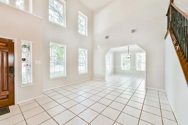 a view of entryway and hall with a window