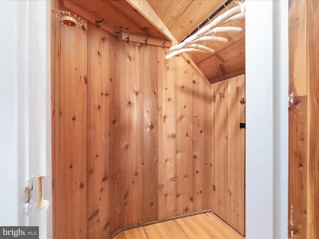 a view of a bathroom from a glass door