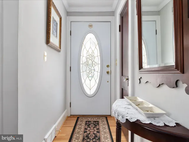 a view of a hallway with windows