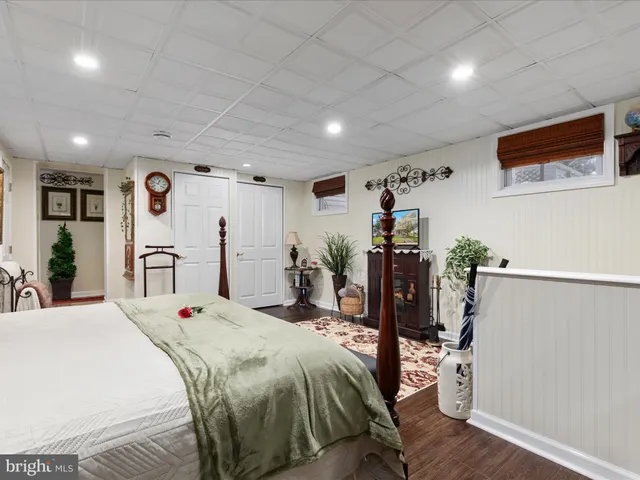 a kitchen with stainless steel appliances granite countertop a refrigerator sink stove microwave and cabinets