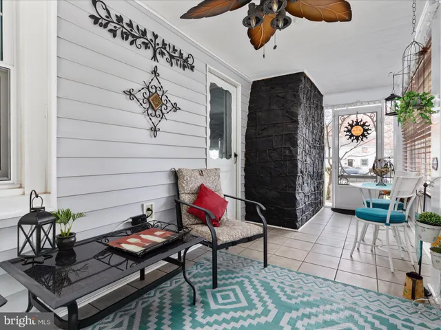 a potted plant sitting in front of a door