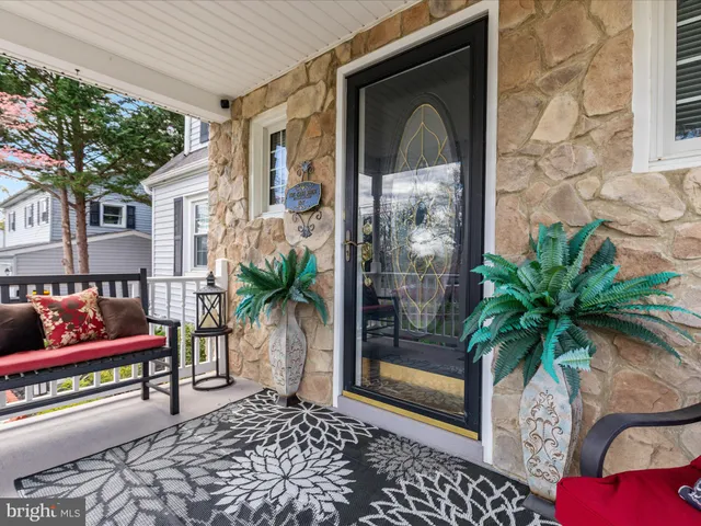 a view of a chairs and table in patio