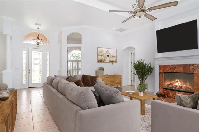 a kitchen with kitchen island granite countertop a sink cabinets and stainless steel appliances