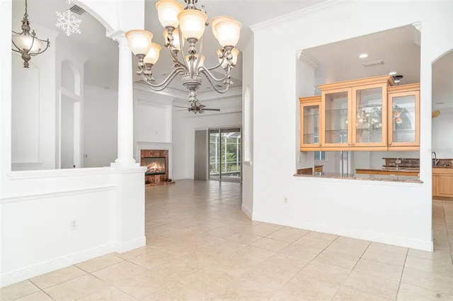 a spacious bathroom with a tub sink and mirror