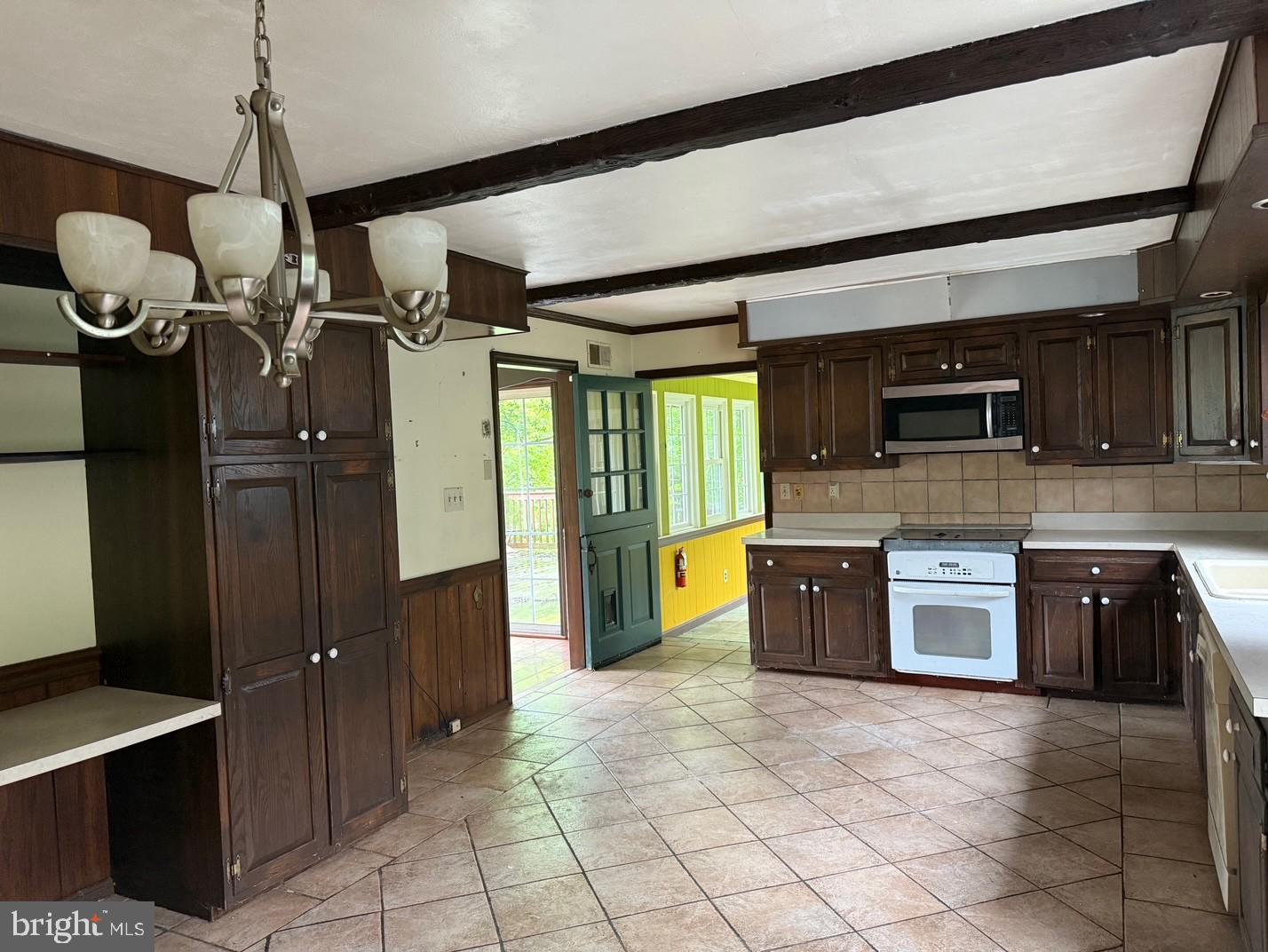 790 Hopewell Road Downingtown, PA 19335 - Photo 15 of 27 a large kitchen with stainless steel appliances granite countertop a refrigerator and a stove top oven