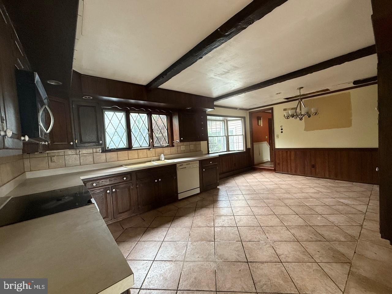 790 Hopewell Road Downingtown, PA 19335 - Photo 17 of 27 a large white kitchen with a sink and cabinets